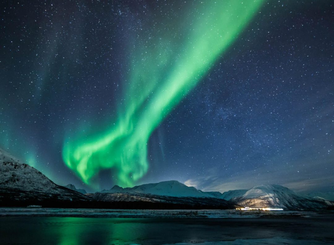 northern lights tromsø water mountains