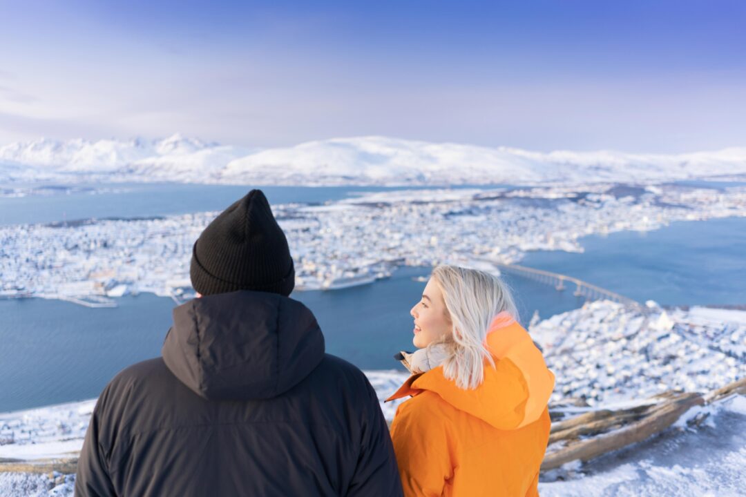 Couple on top of Storsteinen Mountain Tromsø