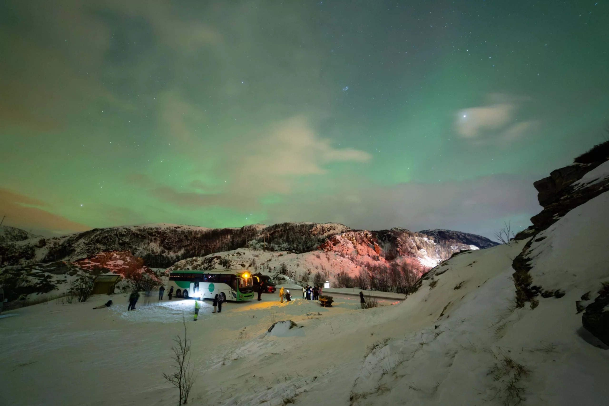 northern lights chase by big bus